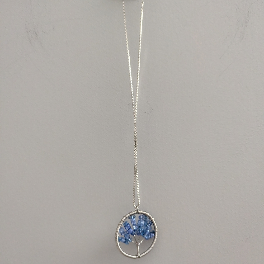 Elegant Silver Necklace with Blue Gem Accents